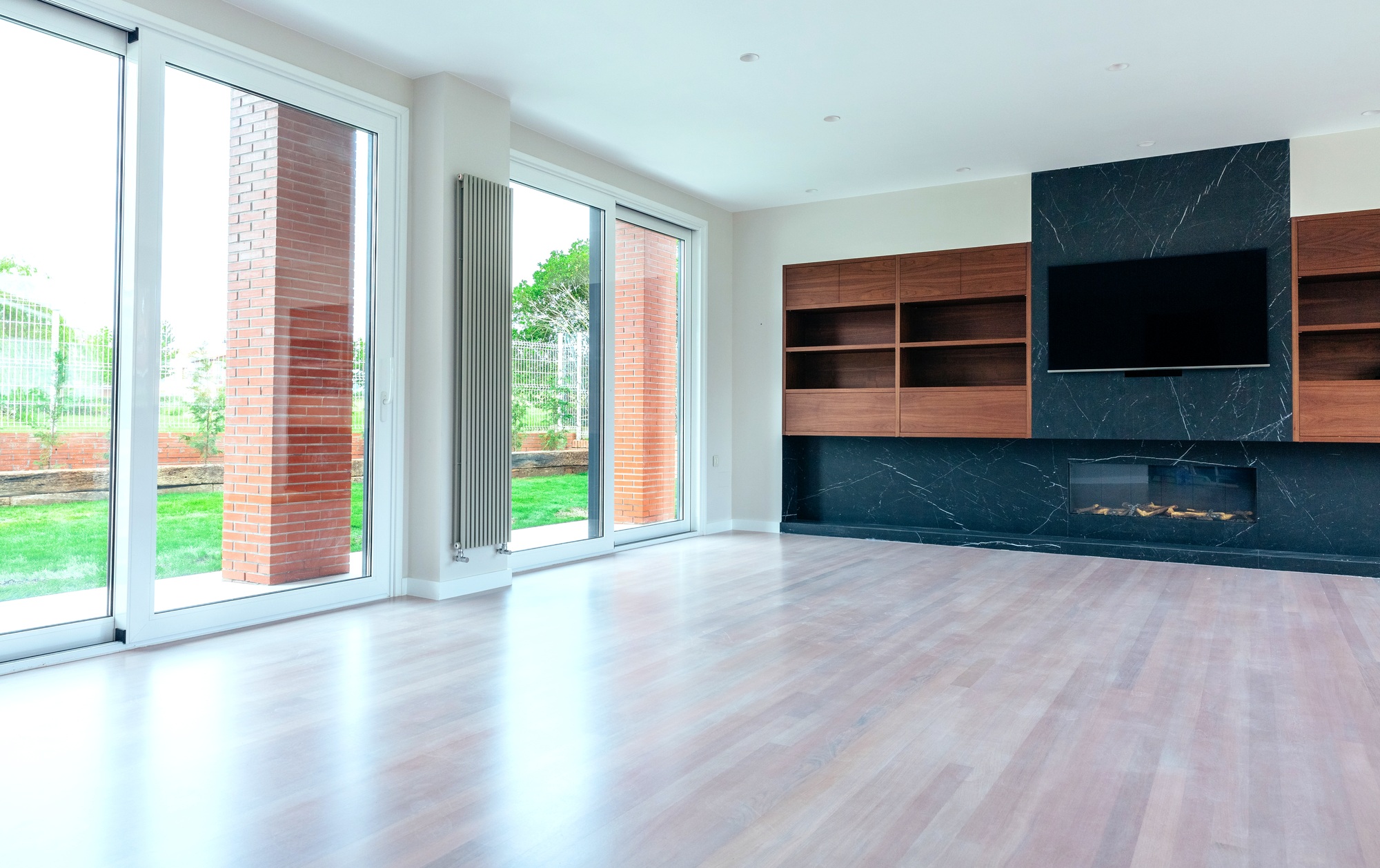 Living room with fireplace and TV