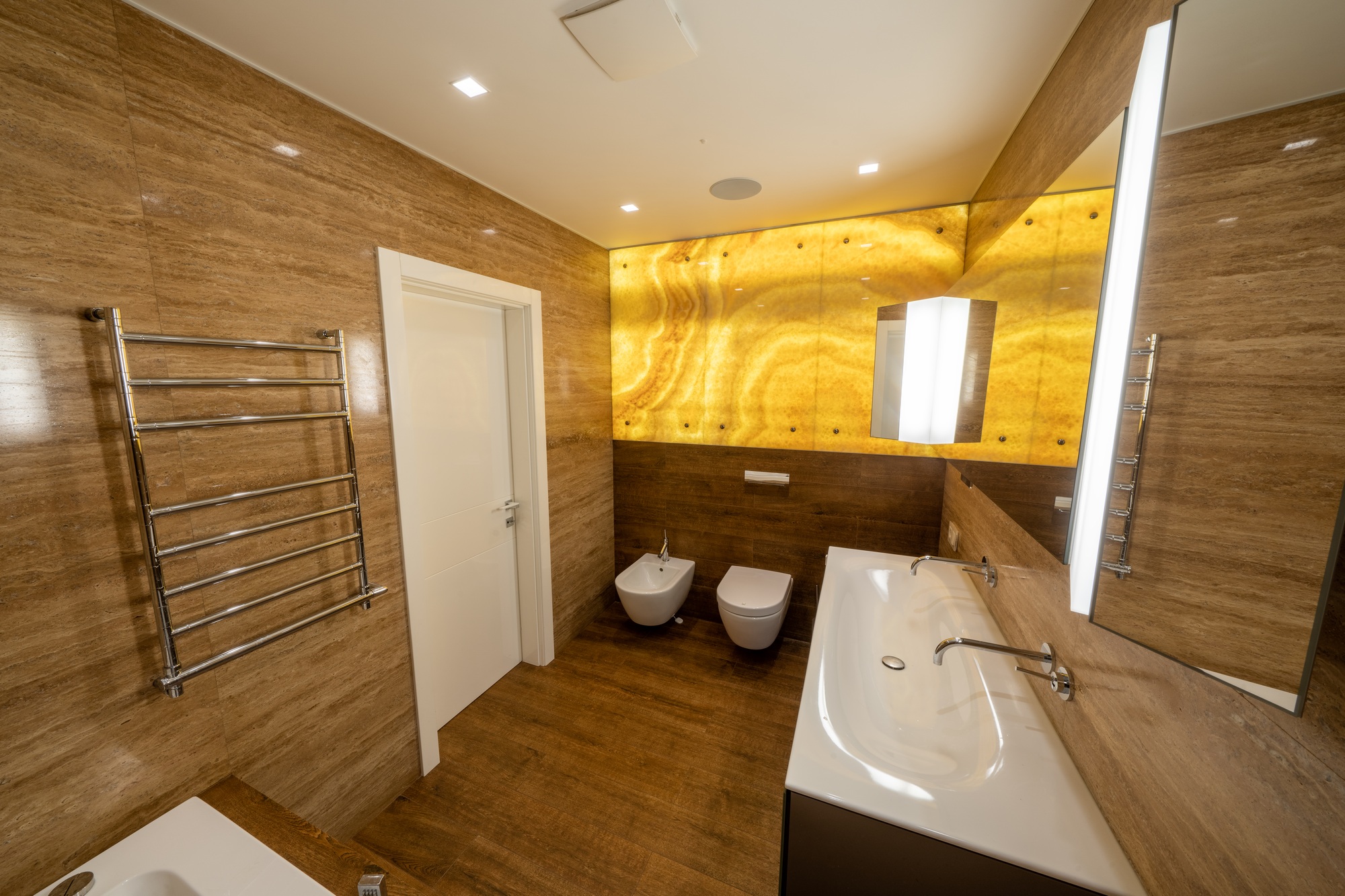 Luxury bathroom vanity. High angle view of the luxury bathroom with wooden walls and floor